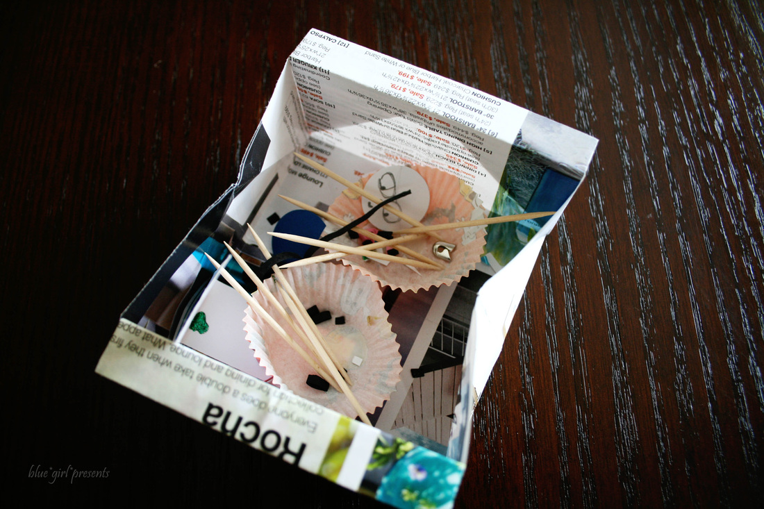 blue girl presents: origami containers made with old catalogs